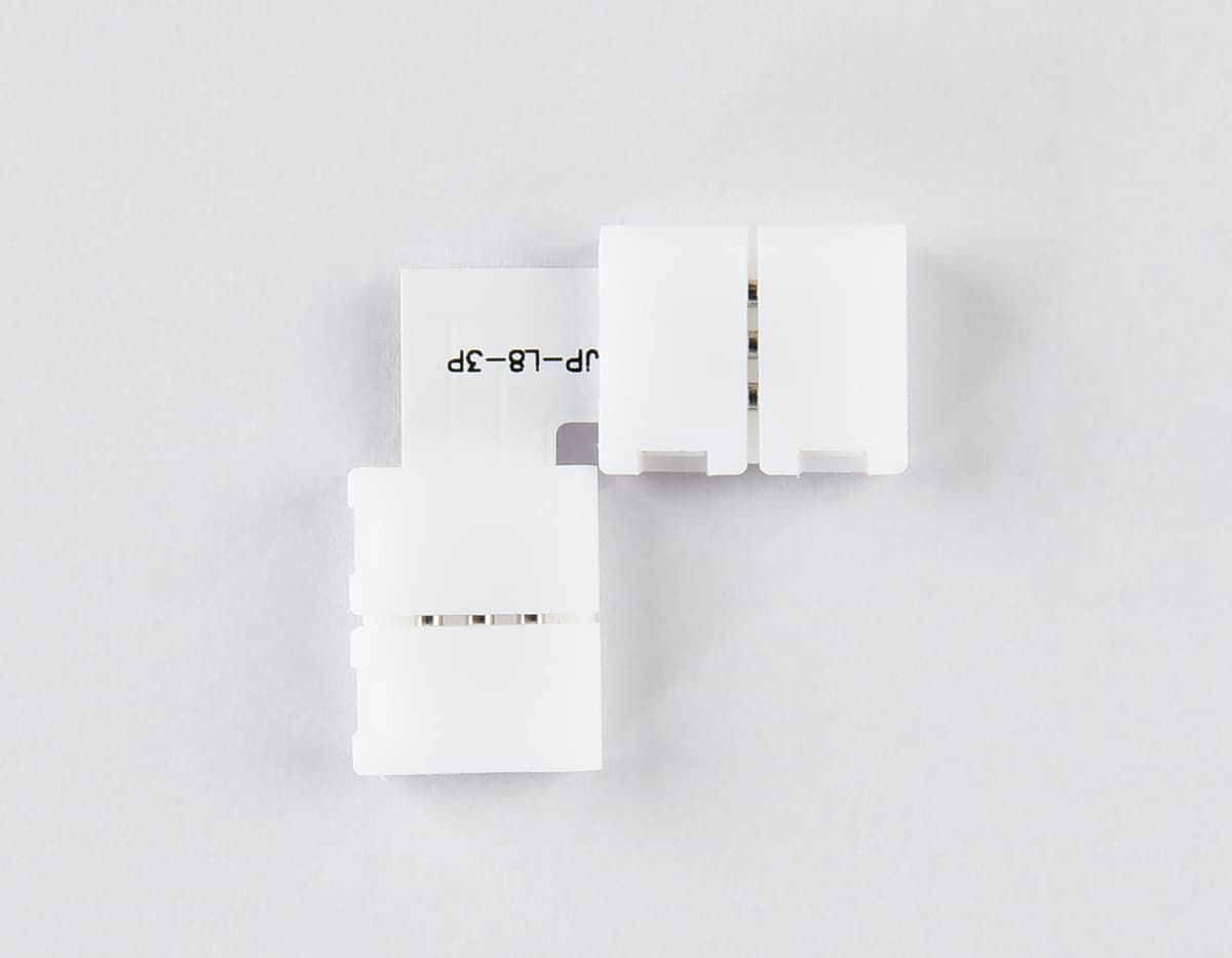 Соединитель угловой L для светодиодной ленты 2835 12/24V (3 конт.) GS6601 (10шт) GS6601 Соединитель угловой L 2835 12/24V (3 конт.) (10шт) Ambrella Light 7