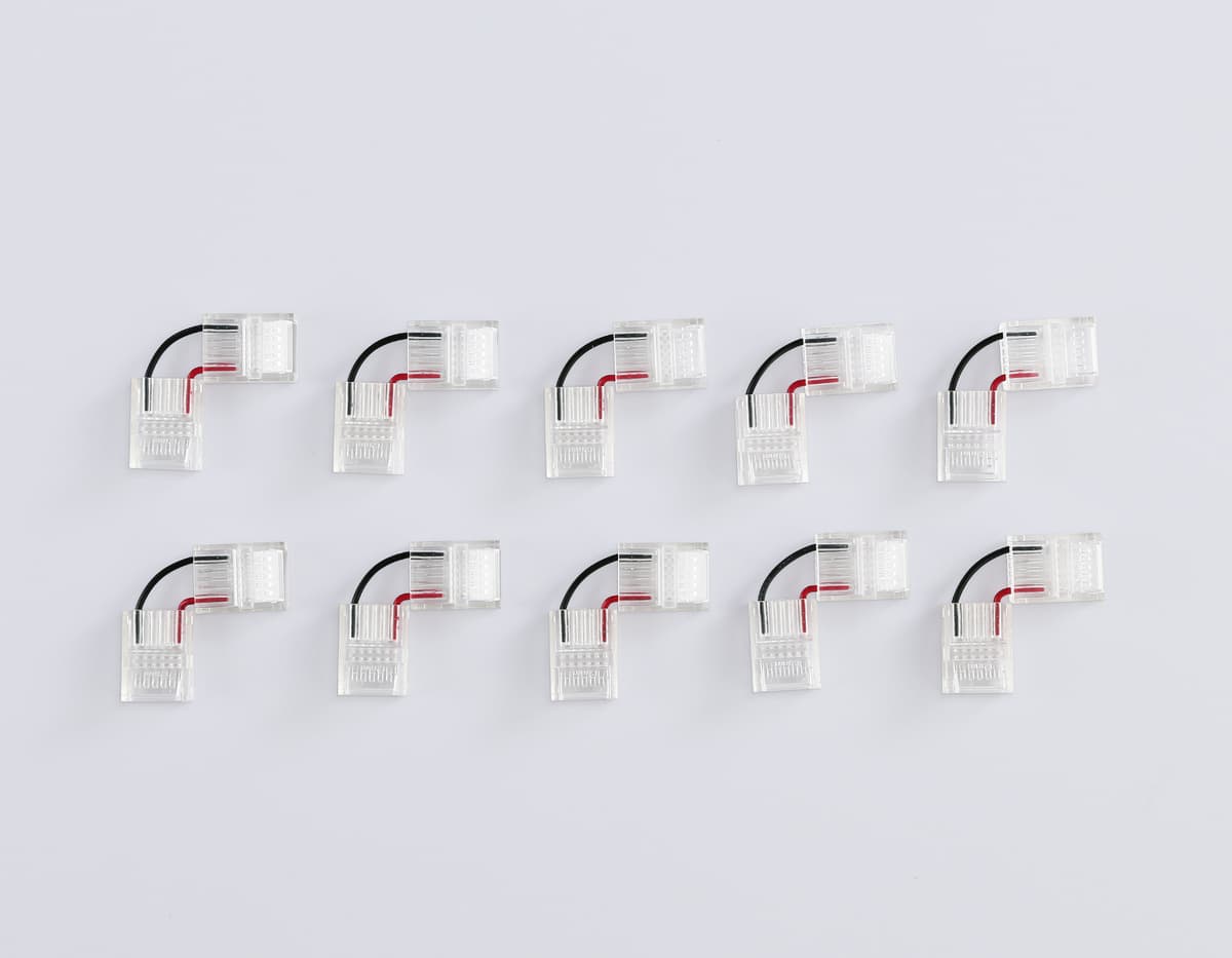 Соединитель угловой COB 12/24V для лент 12mm GS6871 (2 конт.) (10шт. в комплекте) GS6871 Соединитель угловой COB 12/24V для лент 12mm (2 конт.) (10шт) Ambrella Light 7