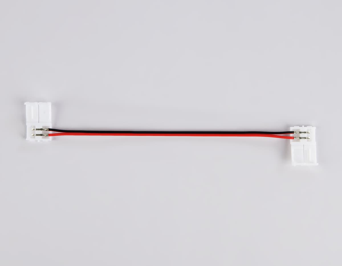 Соединитель гибкий двухсторонний для светодиодной ленты 2835 12/24V (2 конт.) 150 мм GS7551 (10шт) GS7551 Соединитель гибкий двухсторонний 2835 12/24V (2 конт.) (10шт) Ambrella Light 6