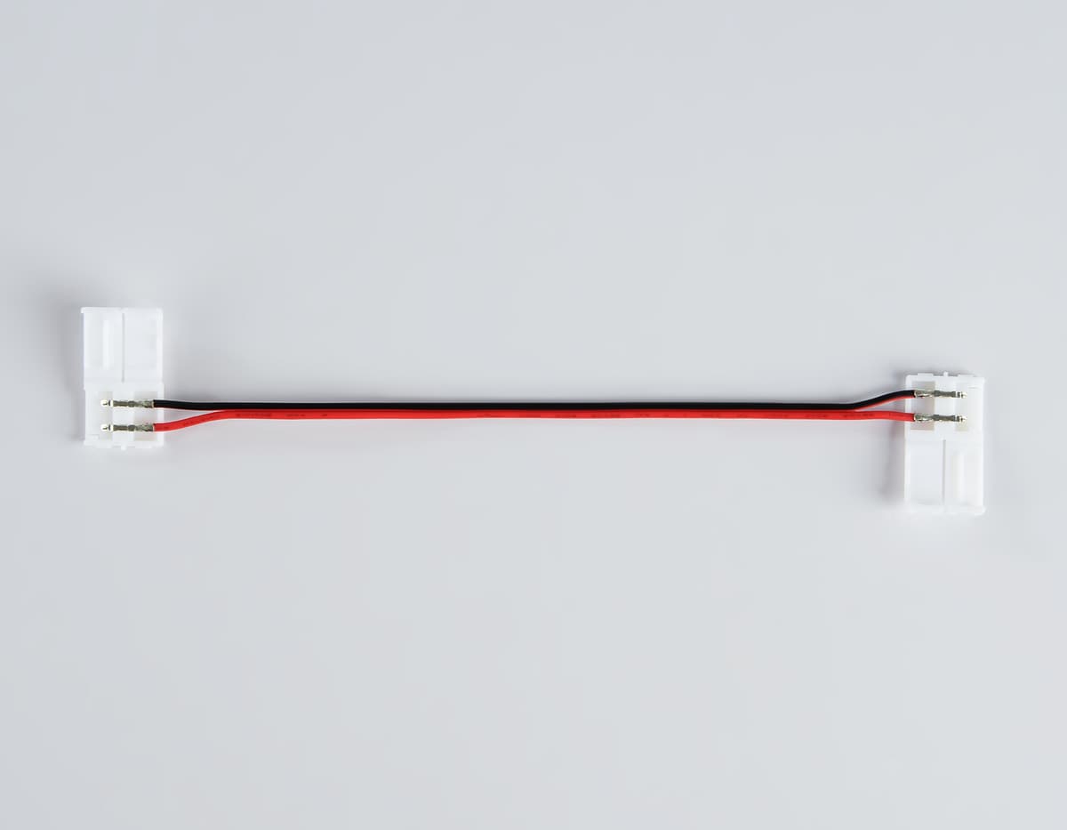 Соединитель гибкий двухсторонний для светодиодной ленты 5050 12/24V (2 конт.) 150 мм GS7601 (10шт) GS7601 Соединитель гибкий двухсторонний 5050 12/24V (2 конт.) (10шт) Ambrella Light 6