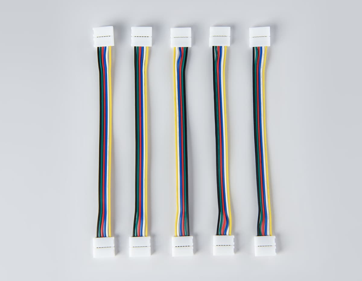Соединитель гибкий двухсторонний для светодиодной ленты 5050 12/24V (6 конт.) 150 мм GS7851 (5шт) GS7851 Соединитель гибкий двухсторонний 5050 12/24V (6 конт.) (5шт) Ambrella Light 7