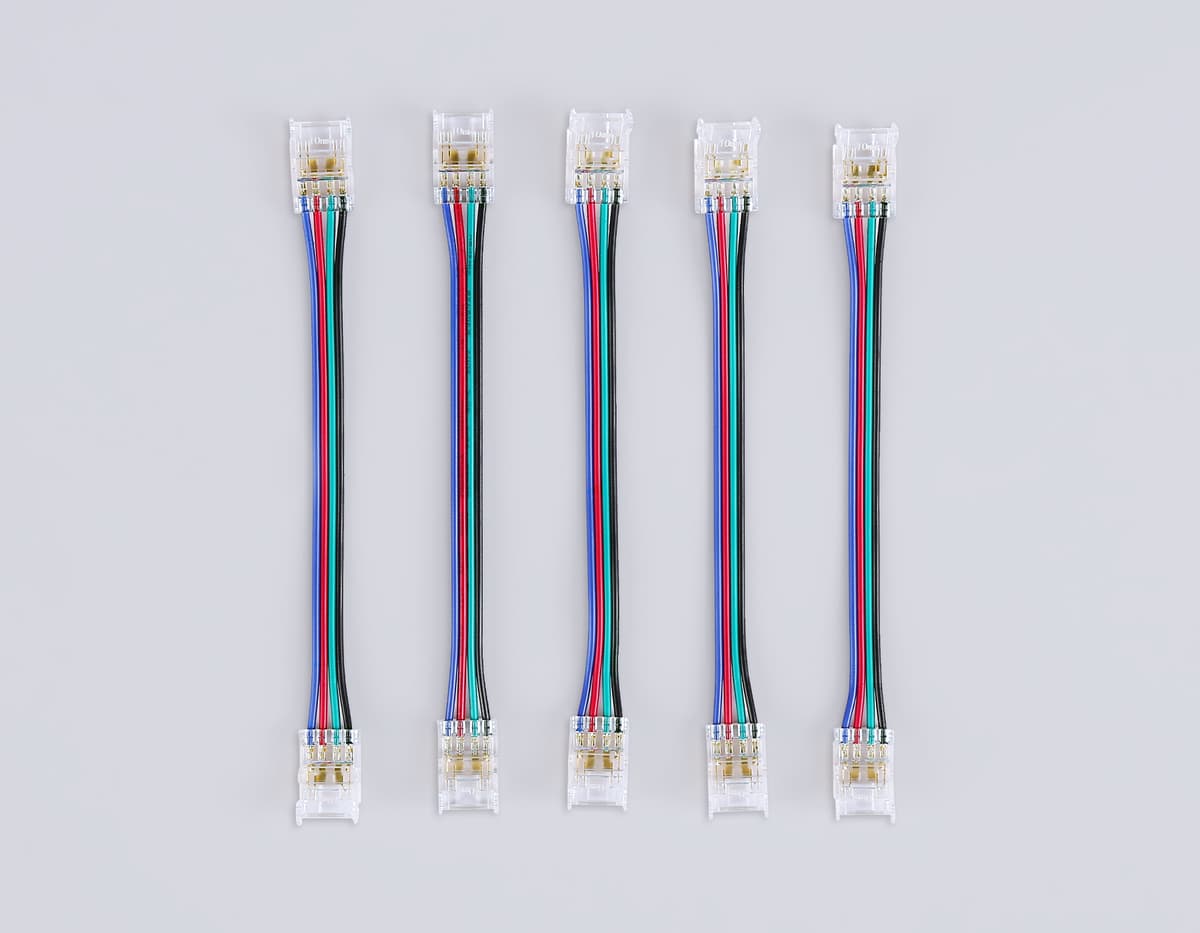 Соединитель гибкий двухсторонний COB RGB 12/24V для лент 10mm GS7921 (4 конт.) (5шт. в комплекте) GS7921 Соединитель гибкий двухсторонний COB RGB 12/24V для лент 10mm (4 конт.) (5шт) Ambrella Light 7