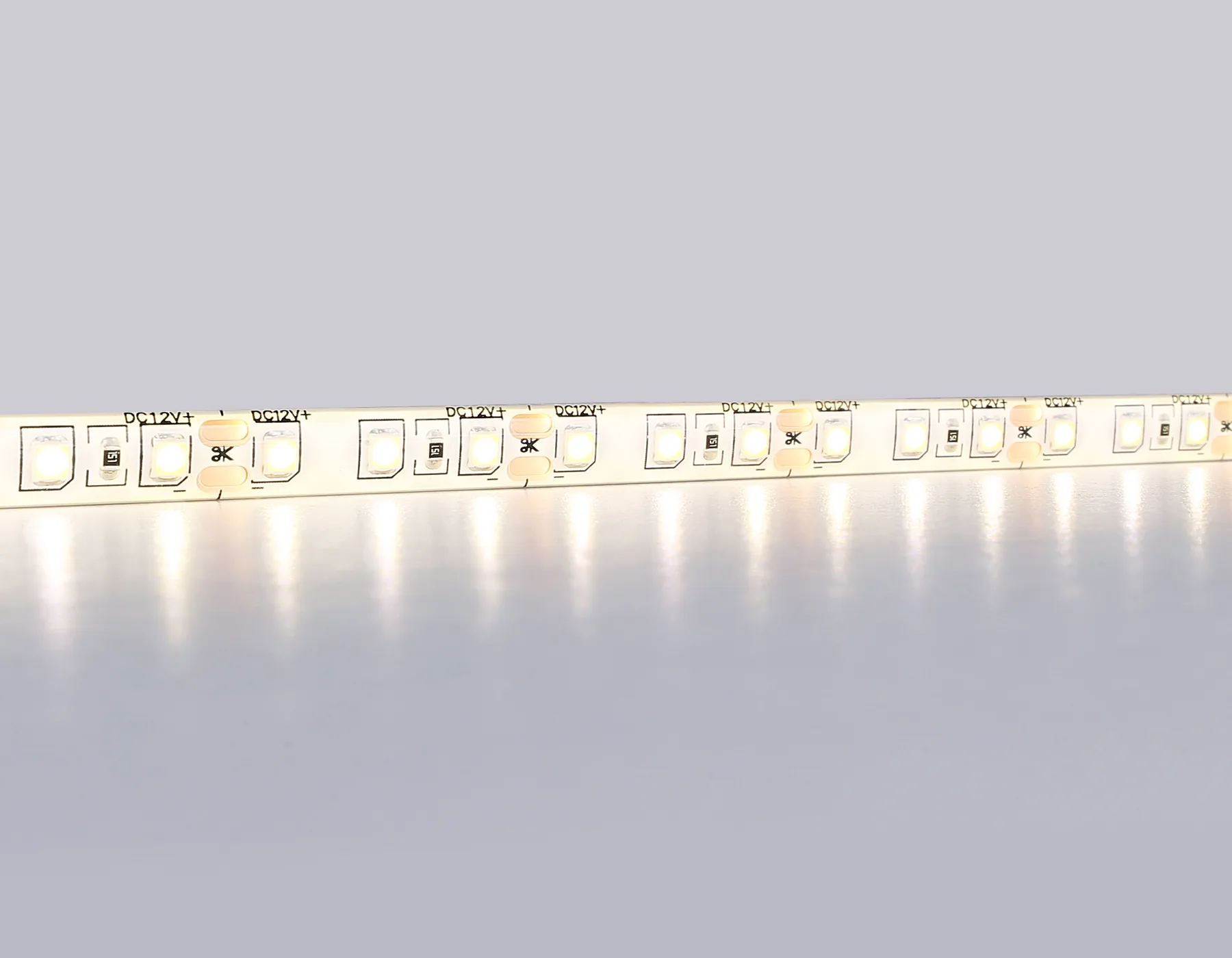 Светодиодная лента 12В 2835 120Led 9.6Вт/м 3000K IP65 5м GS1201 2835 120Led/ 9.6W m/ 12V IP65 3000K/ 5000*8*2.27mm (2 конт.) Ambrella Light 11